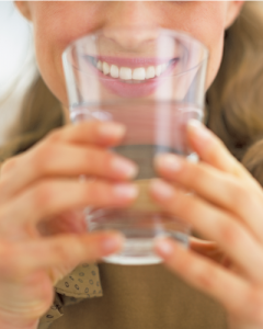 'woman drinking water'